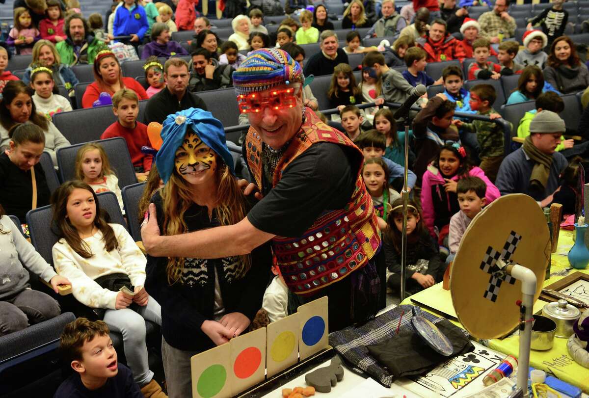 The Magic Genie, shown performing at Saugatuck Elementary School, comes to Wilton Library on Aug. 8.