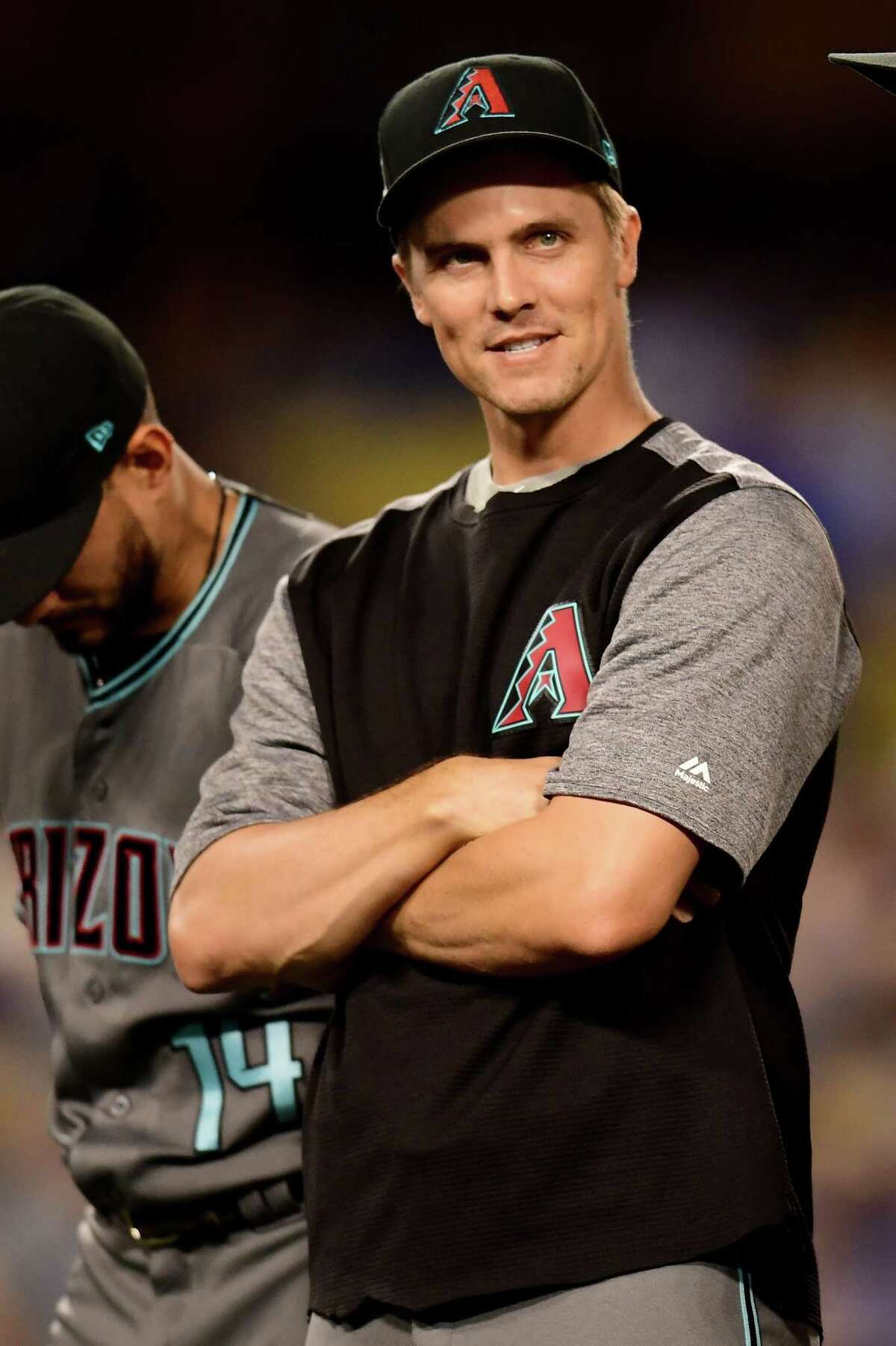 LOS ANGELES, CA - OCTOBER 06: Zack Greinke #21 of the Arizona Diamondbacks looks on during player introductions before taking on the Los Angeles Dodgers in game one of the National League Division Series at Dodger Stadium on October 6, 2017 in Los Angeles, California. (Photo by Harry How/Getty Images) ORG XMIT: 775053742