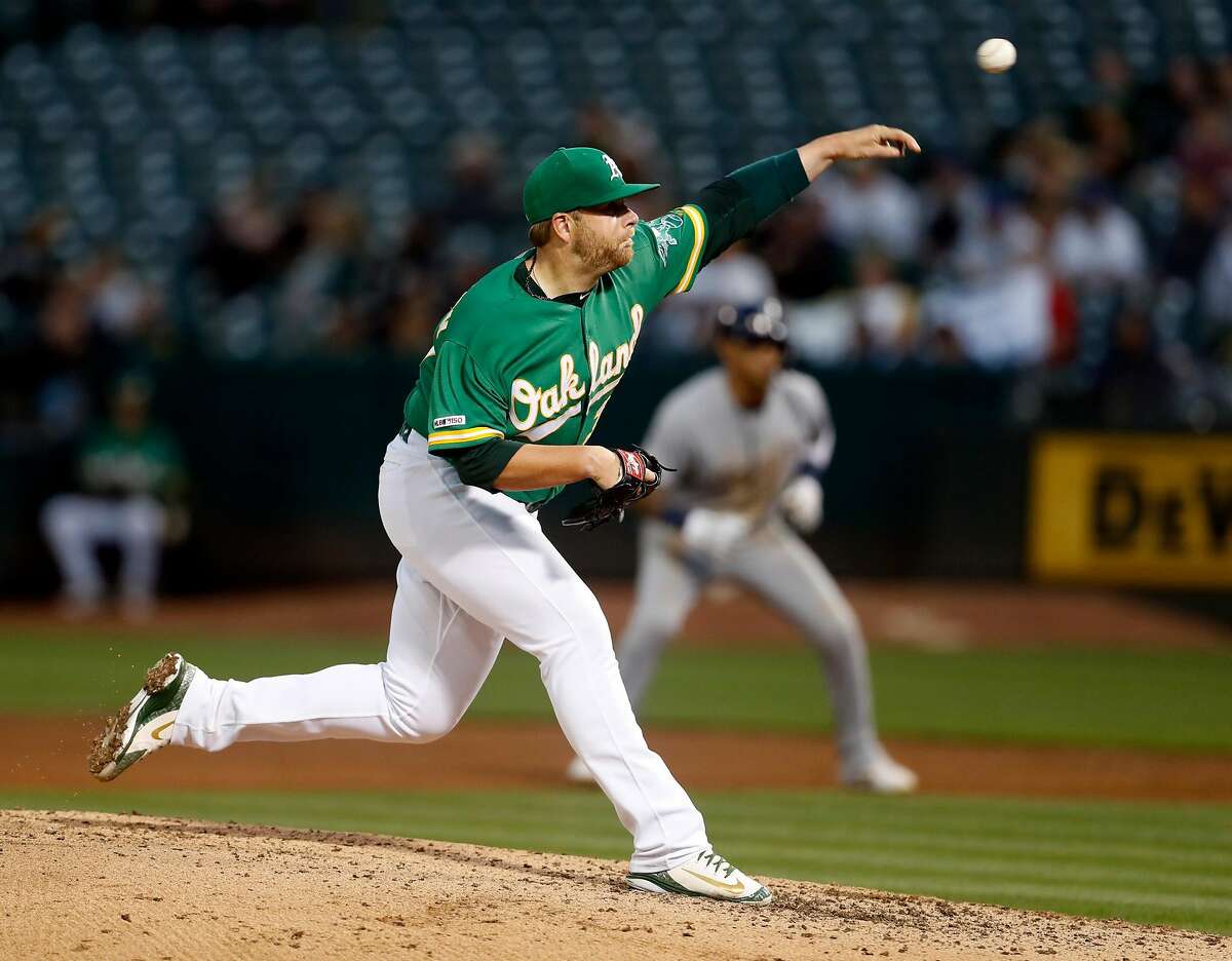 Oakland Athletics' Brett Anderson delivers in 5th inning against Milwaukee Brewers during MLB game at Oakland Coliseum in Oakland, Calif., on Wednesday, July 31, 2019.