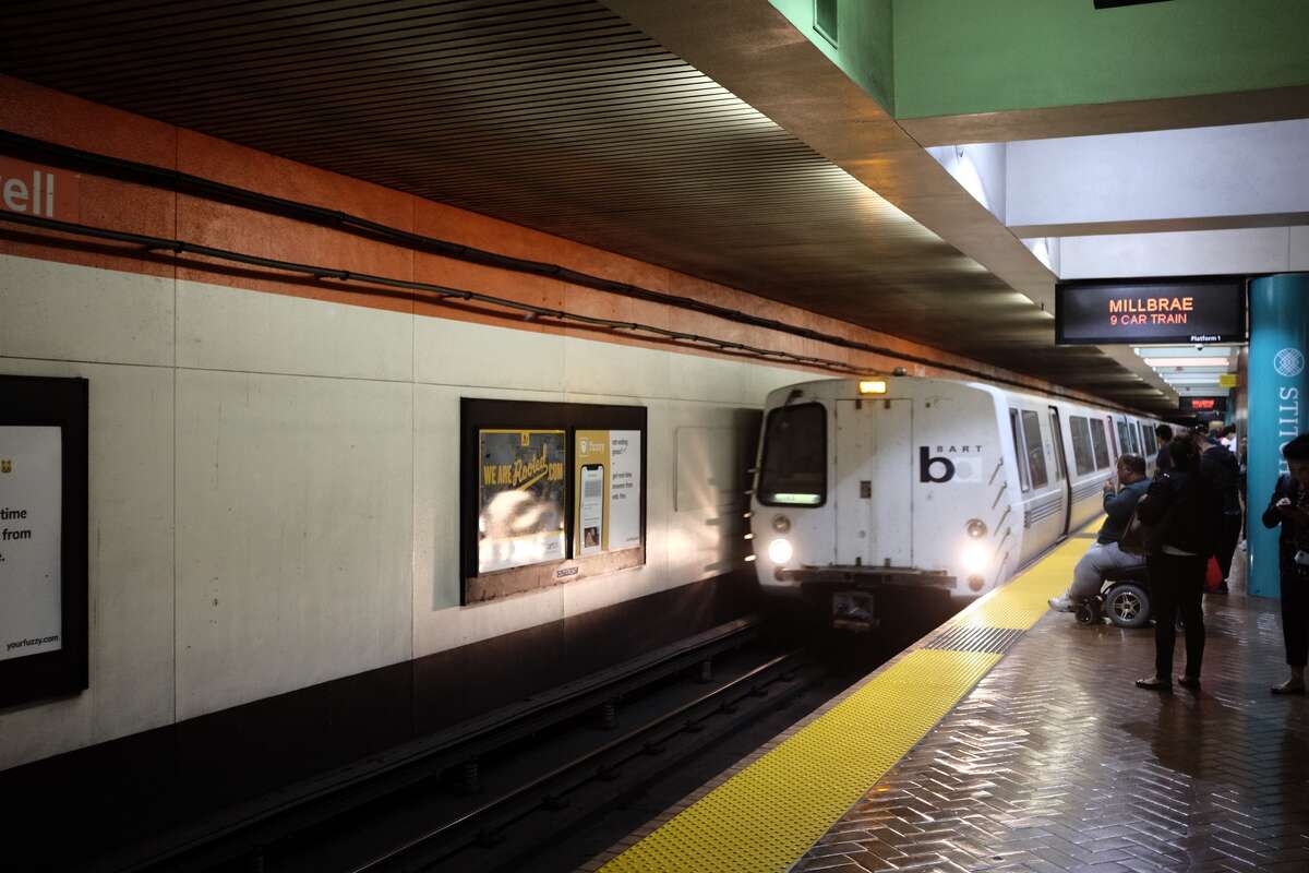 The Millbrae BART train arrives at Powell Street Station. At 4 p.m., ahead of the worst part of the evening commute,  this train might be crowded, but often seats are available.