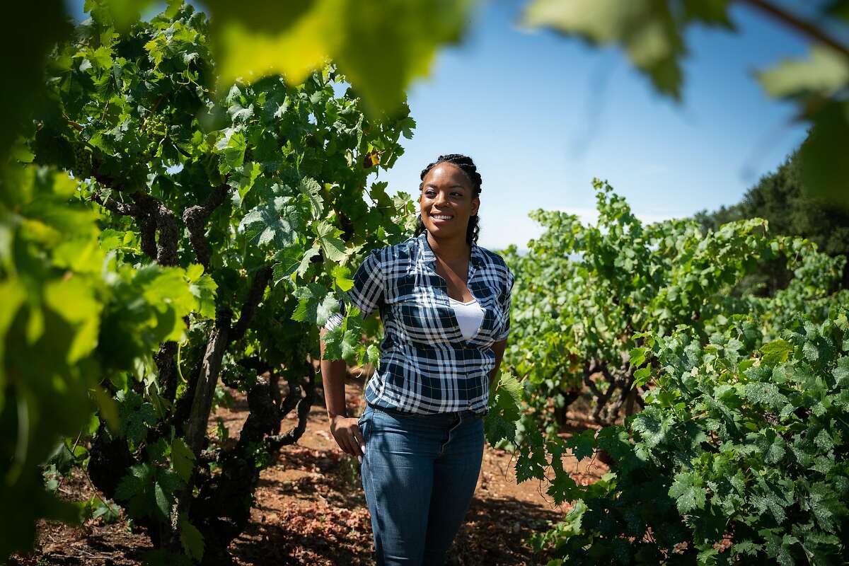 Brenae Royal, 29, poses for a photo near the oldest Cabernet Sauvignon vines at Monte Rosso Vineyard in Sonoma, Calif., on Thursday, July 25, 2019.