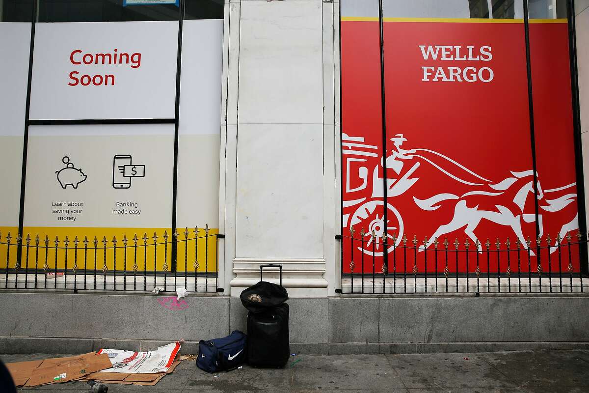 Signs announcing that Wells Fargo bank is coming soon are seen at 601 Market Street on Tuesday, July 30, 2019 in San Francisco, Calif.