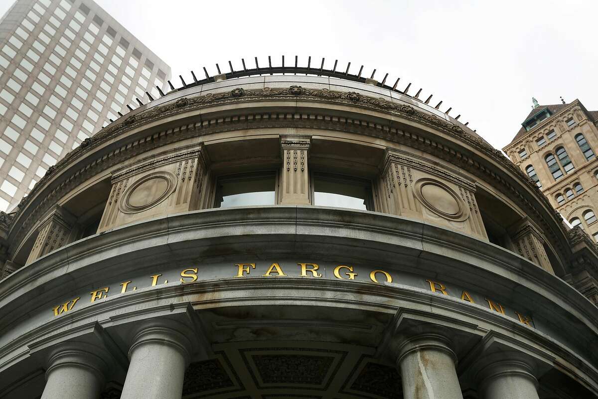 Signage on the Wells Fargo bank at 1 Montgomery Street is seen on Tuesday, July 30, 2019 in San Francisco, Calif.