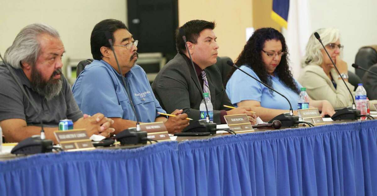 Zeke Mendoza, left, seen in this 2019 file photo, voted against the settlement agreement with Jasmine Engineering during a Nov. 19 board meeting. Veteran trustees Juan Mancha, second from left, Ricardo Moreno and Christine Carrillo expressed reluctance to settle the lawsuit with Jasmine Azima, CEO of the engineering firm they’ve had a long feud with.