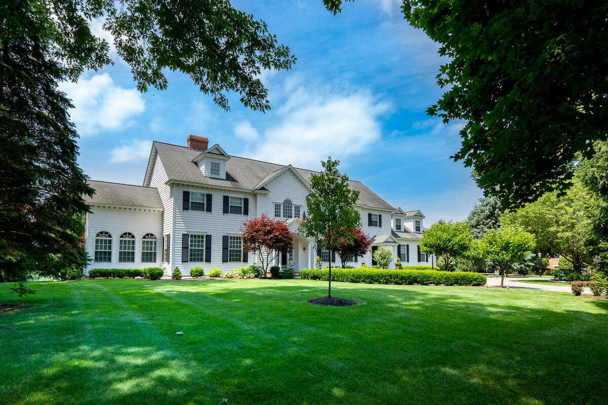 36 E. Ridge Road, Albany: Colonial built in 1997. Views of sunsets and the Schuyler Meadows golf course. Five bedrooms. Highlights are a grand foyer with balcony and sweeping staircase. 5,530 square feet, 1-acre lot. (Photo by Robert Kristel)