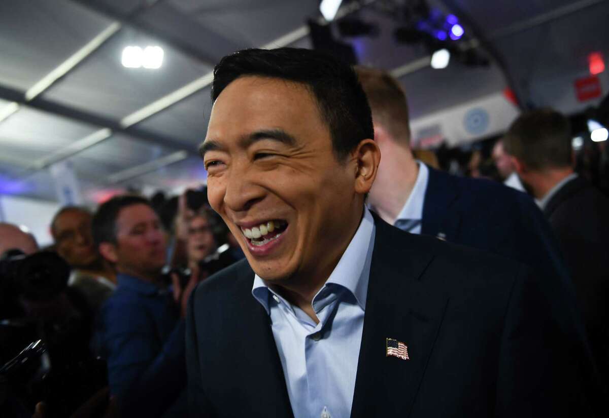 Democratic presidential hopeful US entrepreneur Andrew Yang makes his way through the spin room after the second round of the second Democratic primary debate of the 2020 presidential campaign season hosted by CNN at the Fox Theatre in Detroit, Michigan on July 31, 2019. (Photo by Brendan Smialowski / AFP)BRENDAN SMIALOWSKI/AFP/Getty Images