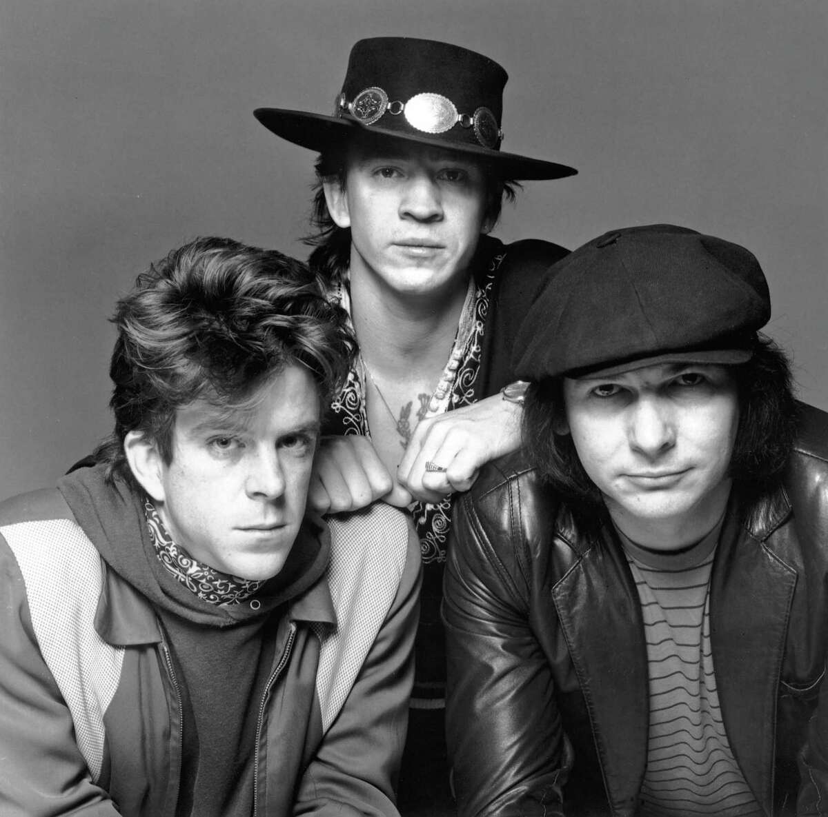 STEVIE RAY VAUGHAN AND DOUBLE TROUBLE. From LeftL Chris Layton, Stevie Ray Vaughan, Tommy Shannon