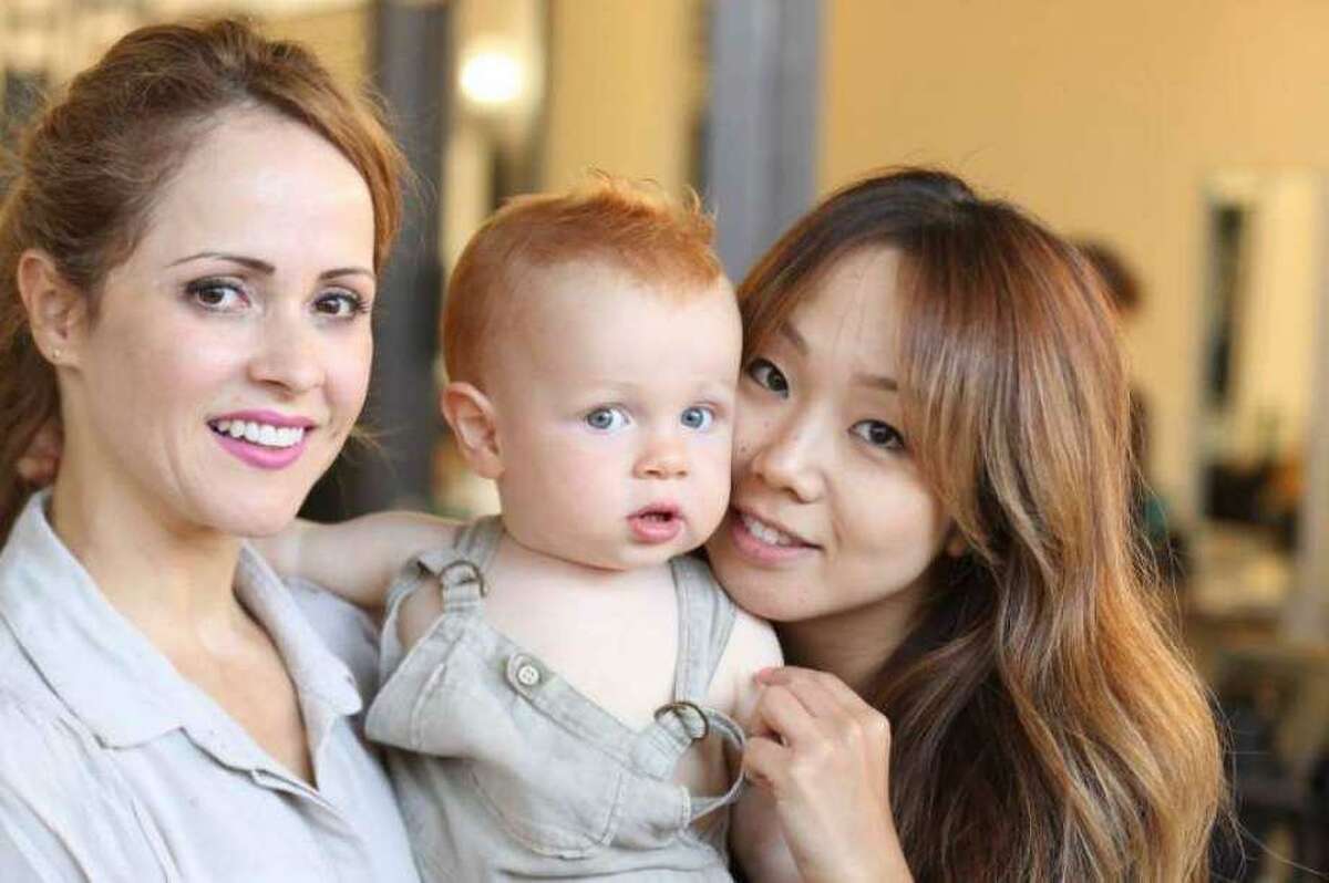 Stamford resident Cristina Vomoca, left, with her son Oliver, and friend Maiko Kobayashi. Vomoca was hit by a truck in Greenwich in 2016 and died eight days later. Her family was awarded $18.75 million for her death.