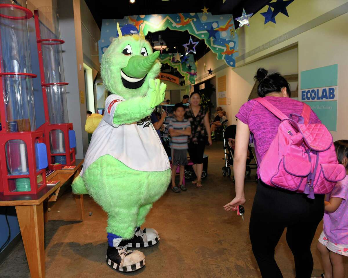 The Sugar Land Skeeters’ mascot Swatson interacts with visitors to the Fort Bend Children’s Discovery Center in Sugar Land on Friday, Aug. 2.