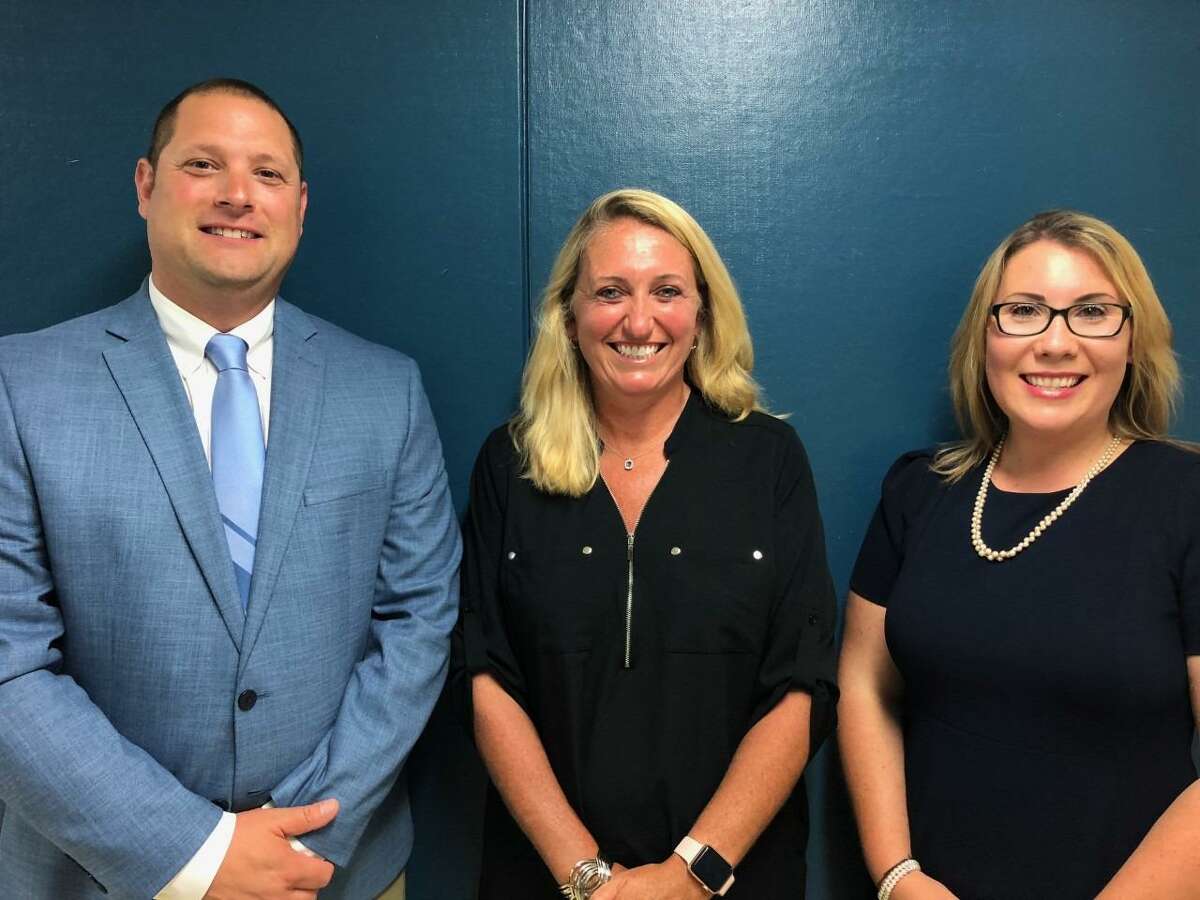 New Shelton High assistant principals Robert Ayer and Victoria Sargeant, right, with new interim high school Principal Kathy Riddle.