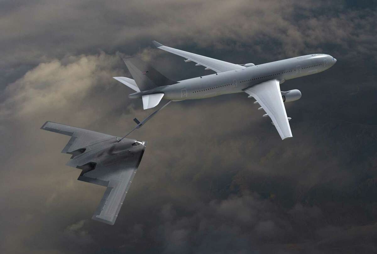 ** CORRECTS BIDDING RESTART FOR SUMMER, NOT SPRING** FILE ** In this artist's depiction provided by Northrop Grumman Corp., a KC-45A refuels a B-2 stealth bomber. Defense Secretary Robert Gates says a new $35 billion aerial refueling tanker competition will restart this summer as planned. (AP Photo/Northrop Grumman Corp, file) ** NO SALES **