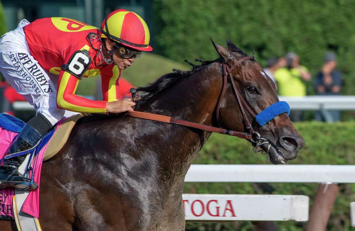 McKinzie with jockey Mike Smith on the way to the win in the 92nd running of The Whitney at the Saratoga Race Course Saturday, Aug. 3, 2019 in Saratoga Springs, N.Y. Photo Special to the Times Union by Skip Dickstein