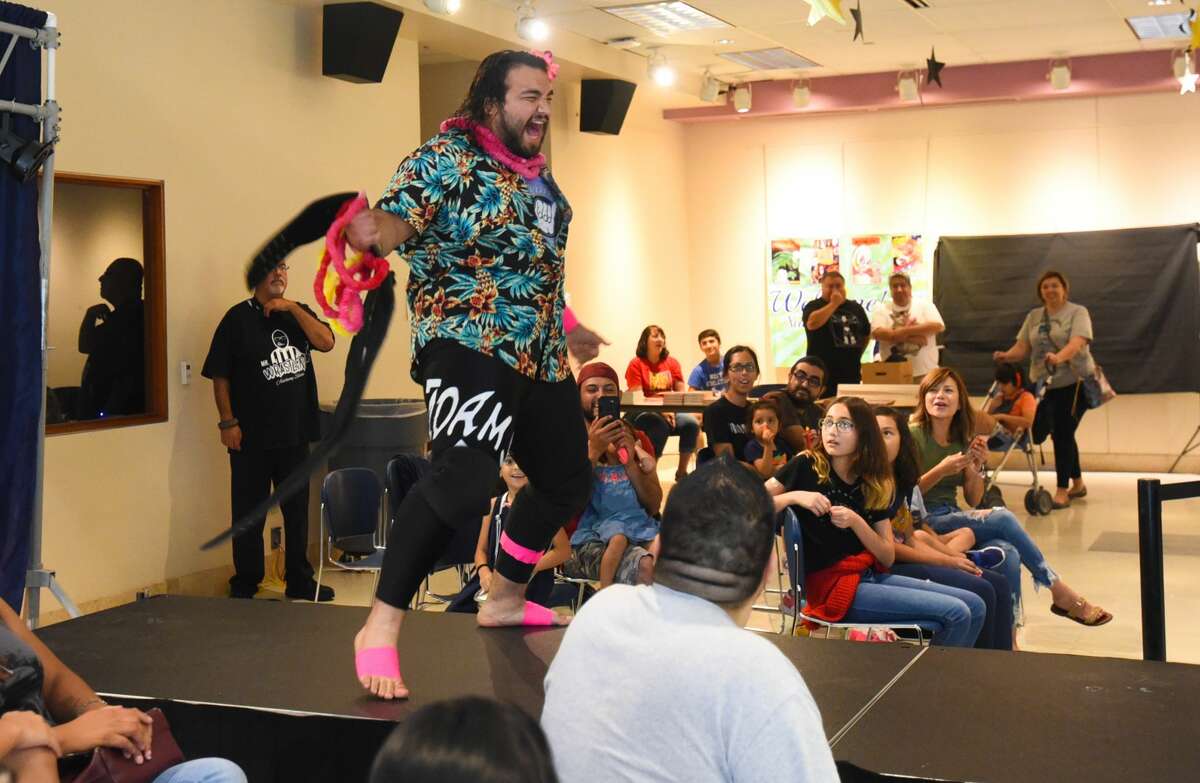 Wrestling fans watch some of their favorite wrestlers during Five Star Wrestling's Lucha at the Library, Saturday, Aug. 3, 2019, at the Joe A. Guerra Laredo Public Library.
