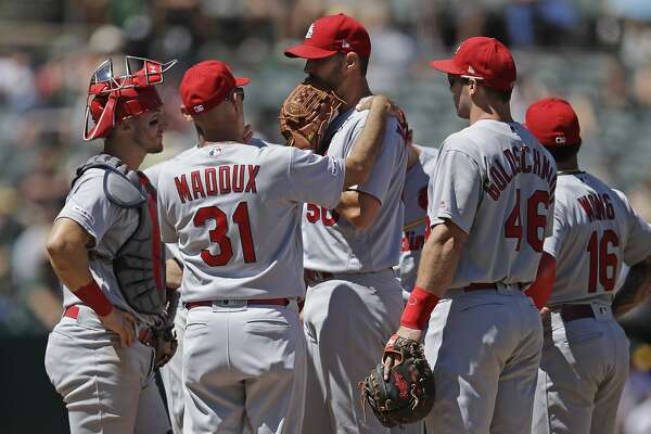 A’s beat Cardinals behind newcomers Tanner Roark, Dustin Garneau - 0