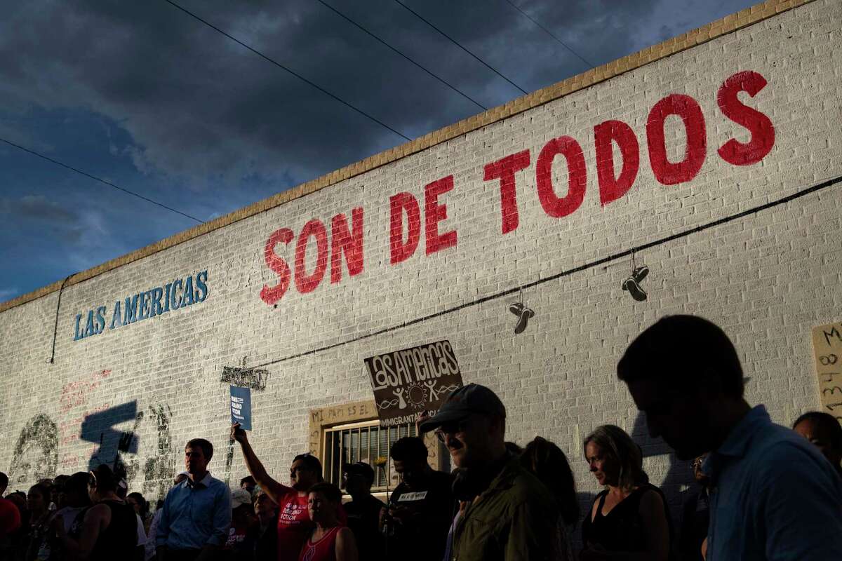 Democratic presidential candidate Beto O'Rourke and a large crowd gather by the new mural at Las Americas Headquarters during an anti violence rally Sunday, Aug. 4, 2019, in El Paso.