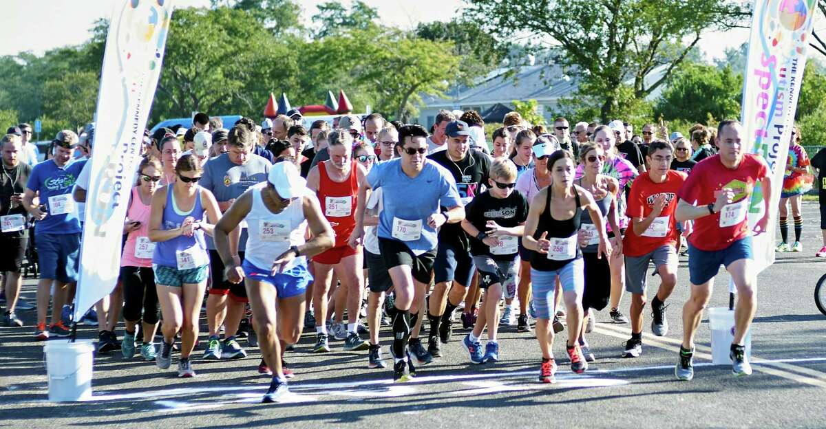 Runners leave the starting line of the 2018 Kennedy Center Autism SpectRUN. The 2019 run is September 8 at Jennings Beach in Fairfield. The event supports the autism programs at the Trumbull-based center.