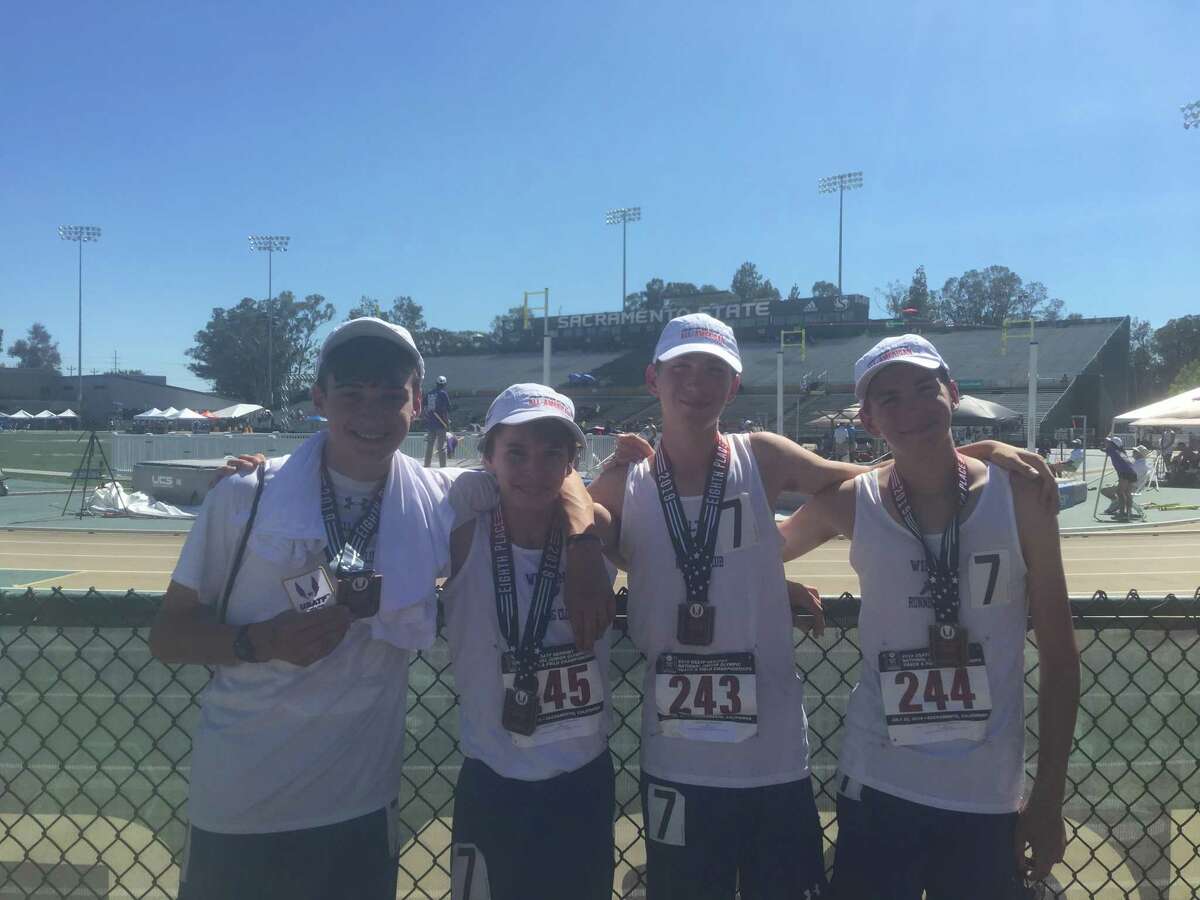 Wilton Running Club members Sam Kurian, Steve Hergenrother, Danny Gall, and Brian Gall (left to right) combined to finish eighth in a relay and earn All-America honors at the National Junior Olympics.