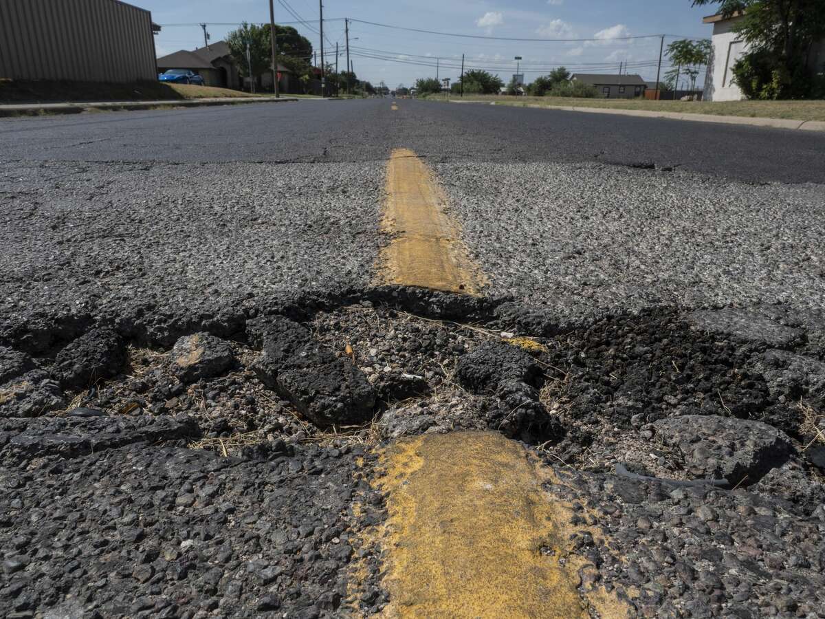Pothole in the middle of Main Street between Pecan and Oak Street in this file photo. Reporter-Telegram