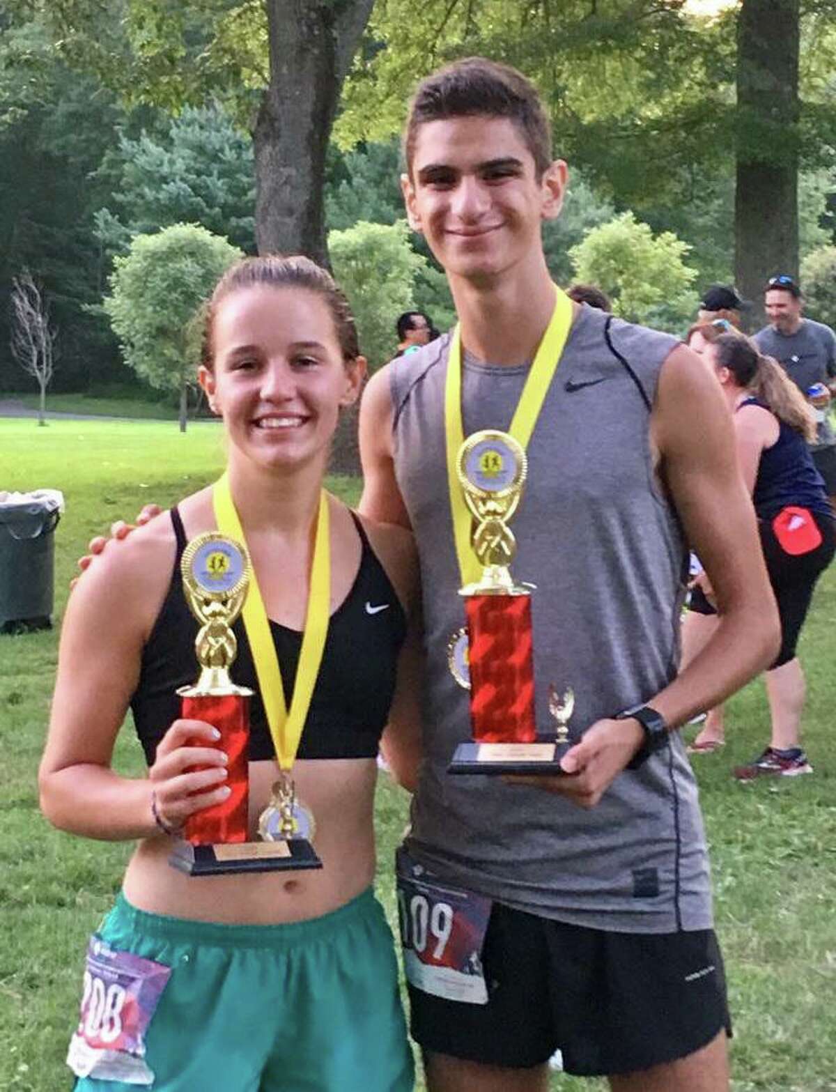 Trumbull's Kate Romanchick and Chris Lepore took first at the Sunset Run and the MAAD 5K.