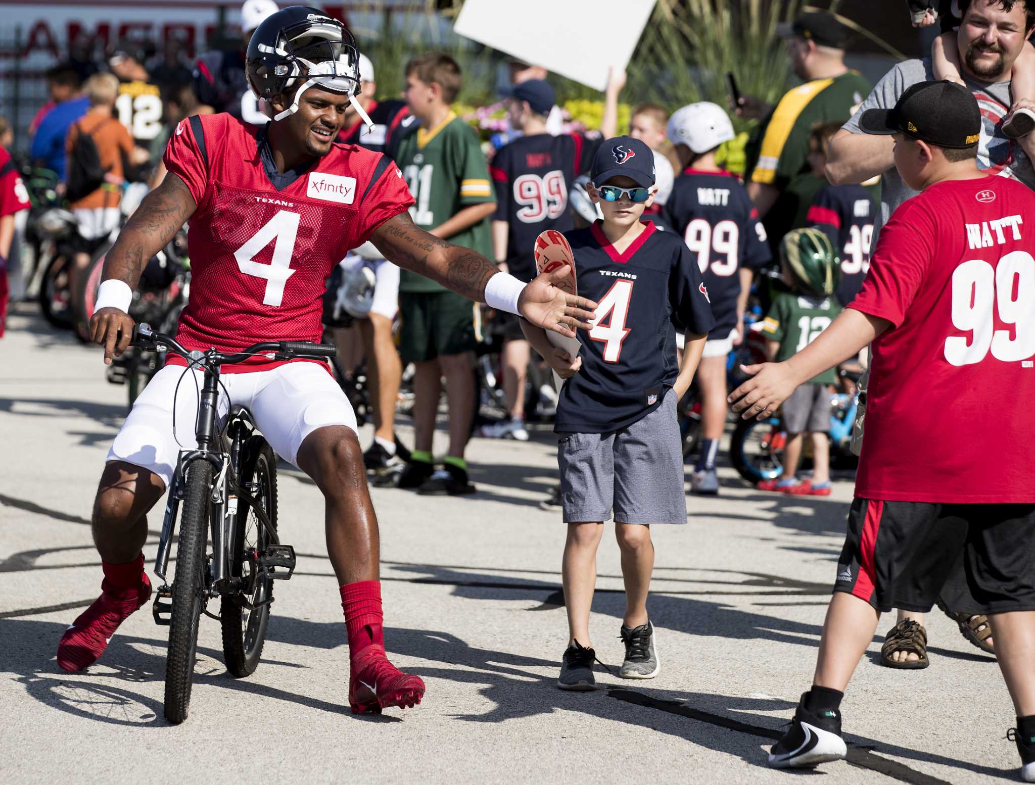 J.J. Watt participates in Packers tradition, breaks kid's bike in process