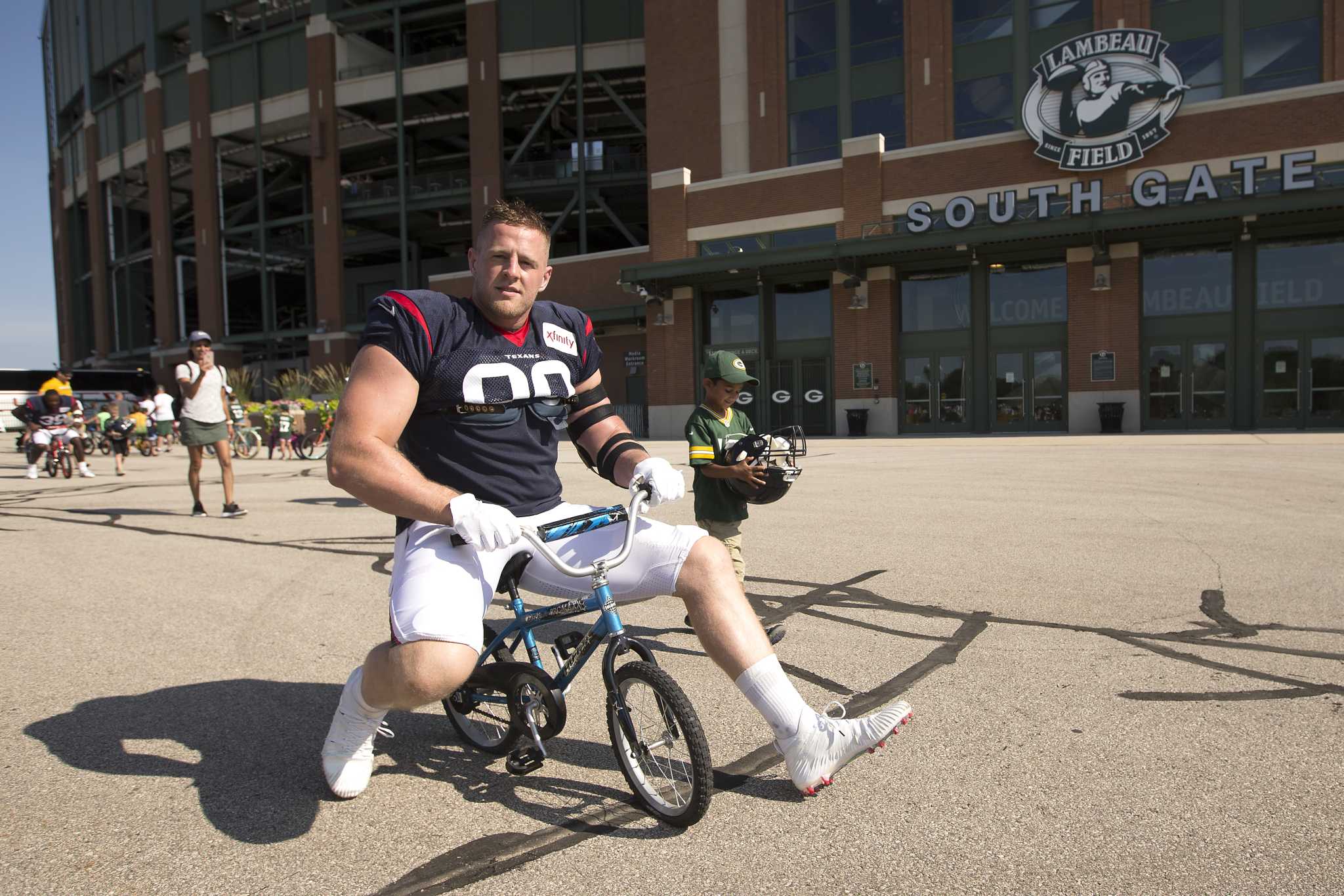 J.J. Watt, Texans embraced by training camp bike riders