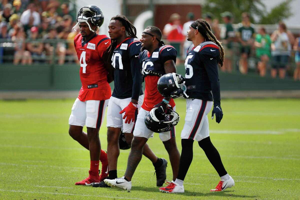 Houston Texans quarterback Deshaun Watson (4) walks with wide receivers DeAndre Hopkins (10), Keke Coutee (16) and Will Fuller (15) during a joint training camp practice with the Green Bay Packers on Monday, Aug. 5, 2019, in Green Bay, Wis.