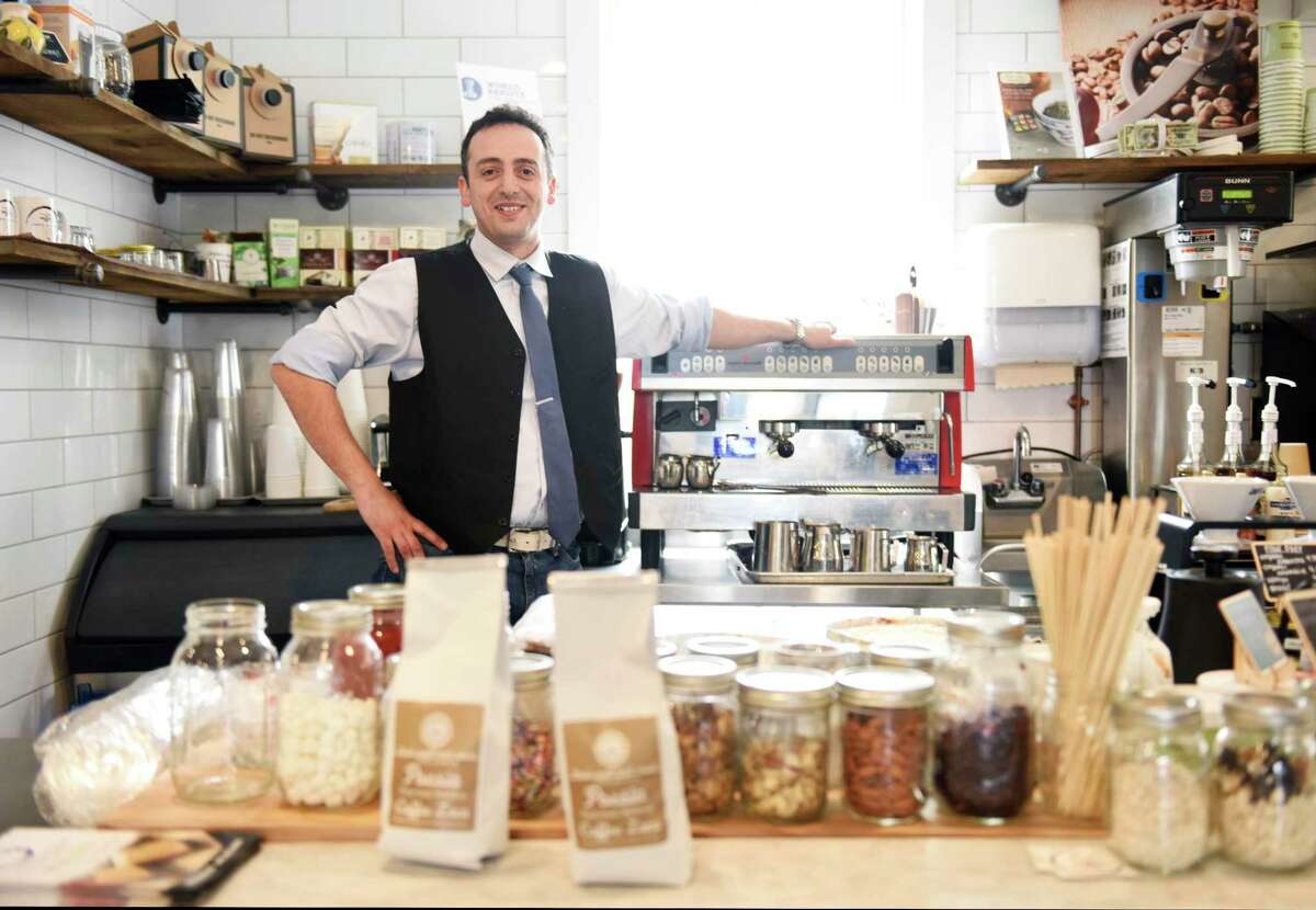 Owner Luca Morabito at the Coffee Luca bar inside Something Natural in Greenwich in April. Coffee Luca opened inside Something Natural this year, offering coffee and espresso drinks, pastries, pies and more.