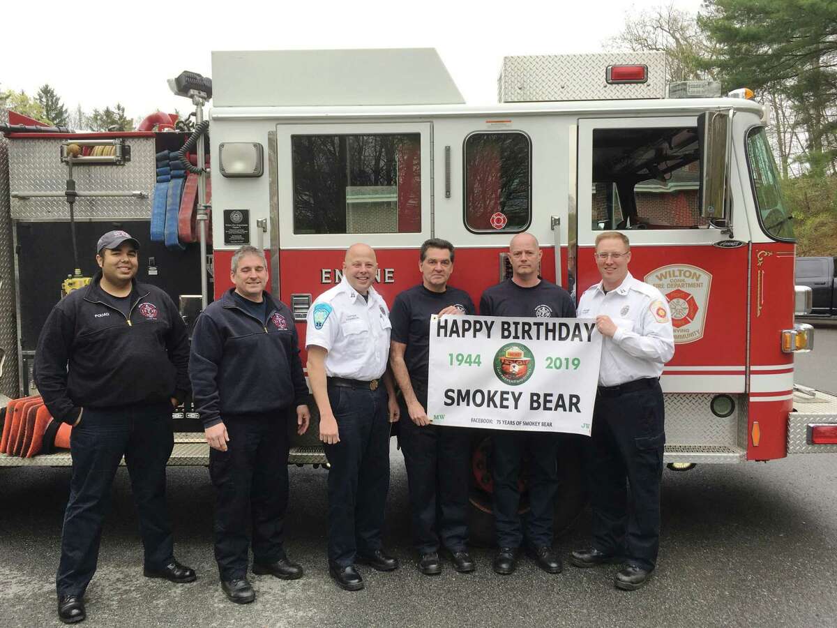 Members of the Wilton Fire Department spread the word of Smokey Bear's 75th birthday on Aug. 9, 2019. From left: Firefighter Noah Fouad, Firefighter Michael Wydra, Capt. Kevin Czarnecki, Deputy Fire Marshal Kevin Plank, Firefighter Mike Pryor and Capt. Brian Elliott.
