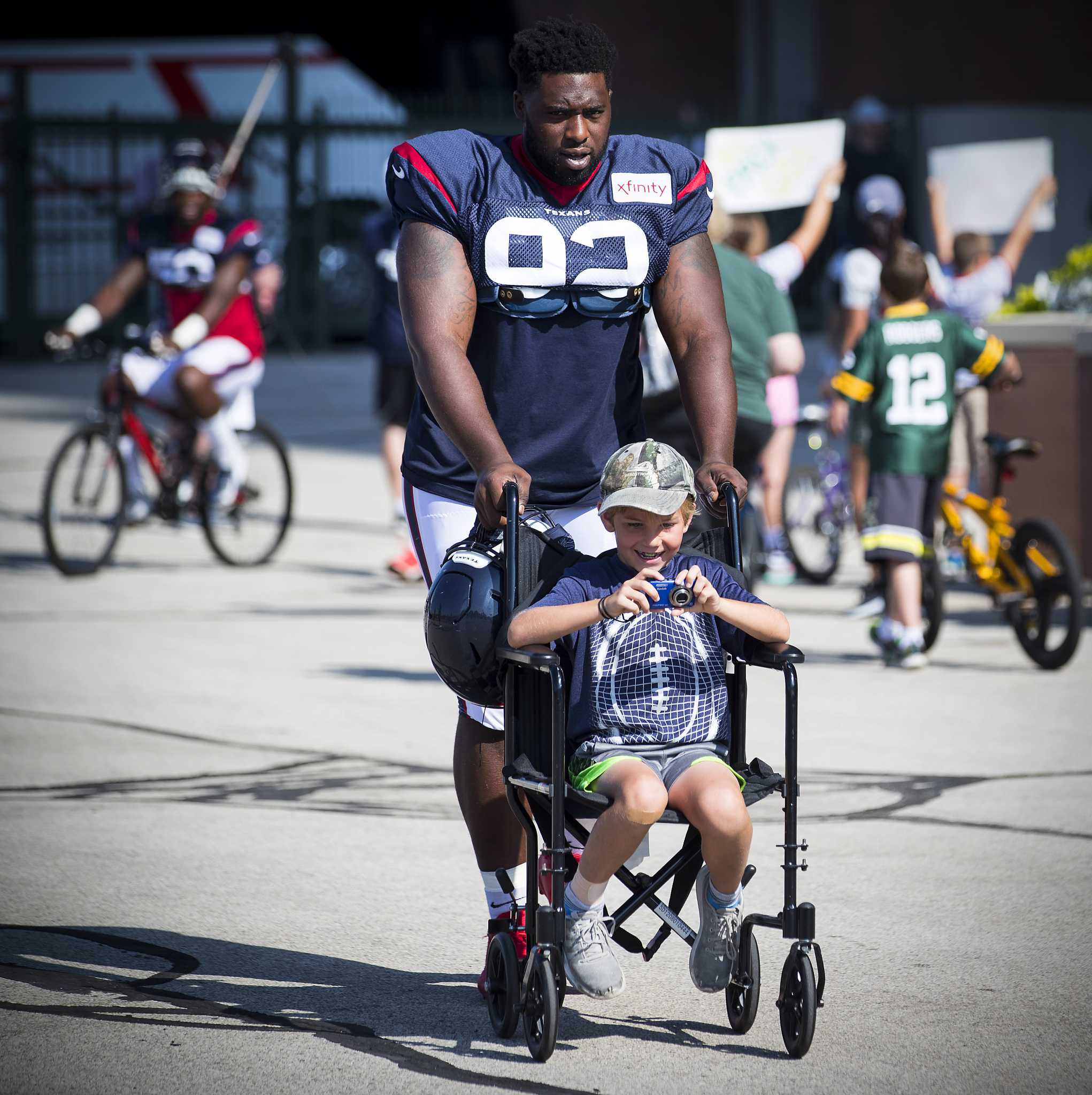 JJ Watt Accidentally Breaks Child's Bicycle During Packers Tradition