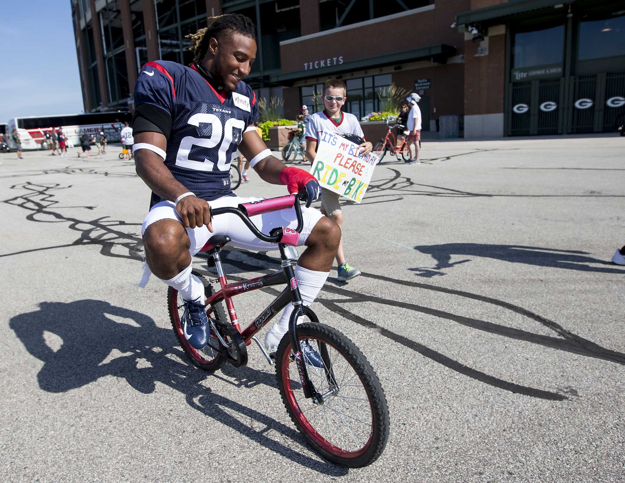 JJ Watt Accidentally Breaks Child's Bicycle During Packers Tradition