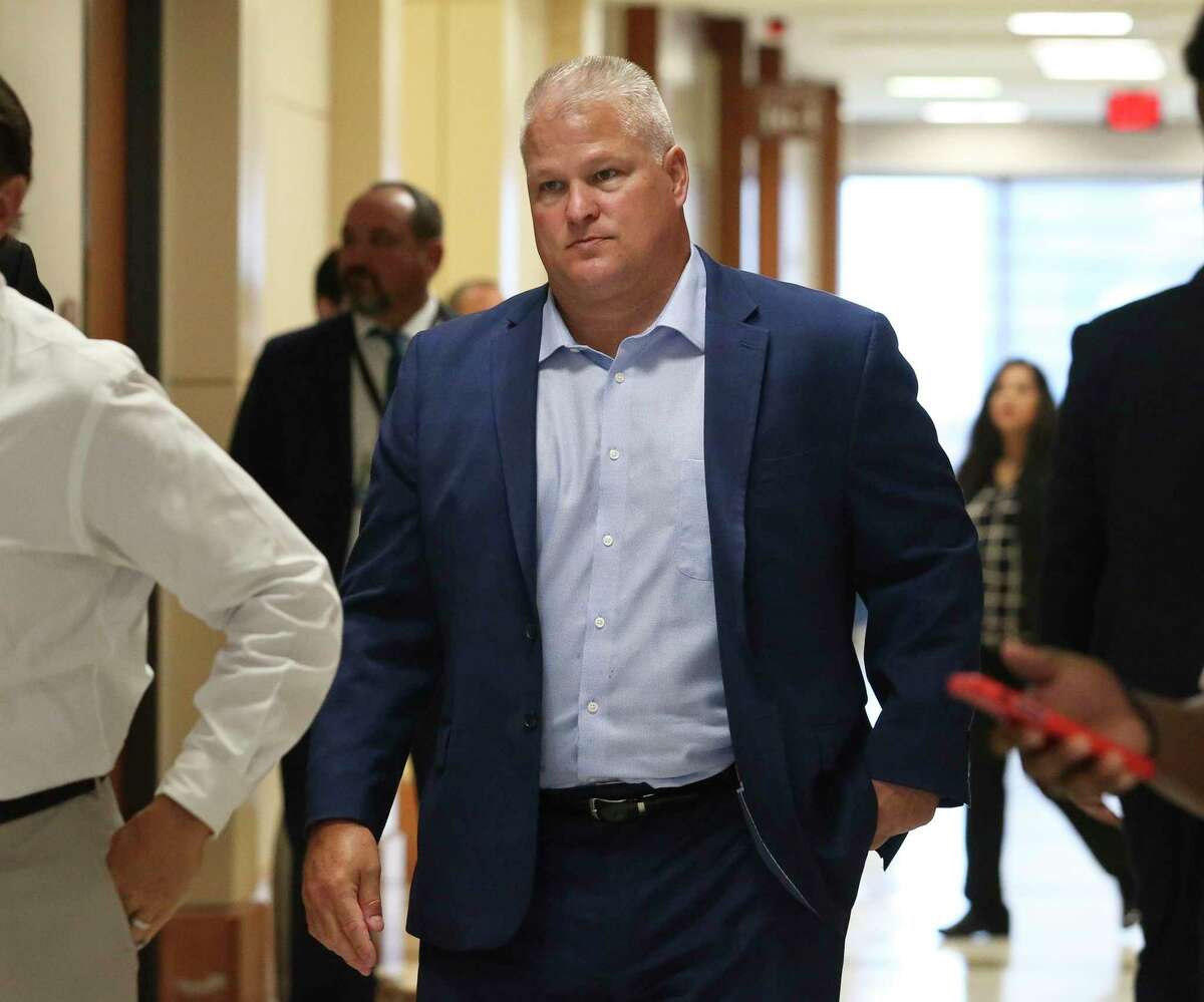 David Temple, who is accused of killing his wife, Belinda Lucas Temple, in 1999, walks back to the courtroom during a break at the Harris County Criminal Courts on Monday, Aug. 5, 2019, in Houston. Lawyers from both sides present closing arguments to the jury in the the murder retrial of Temple.