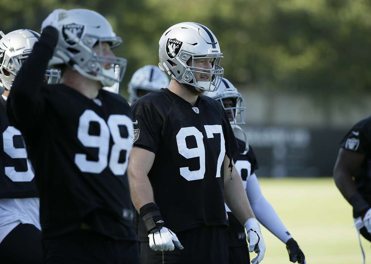 Oakland Raiders defensive end Josh Mauro (97) celebrates his