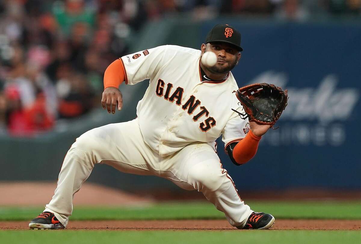 SAN FRANCISCO, CA - AUGUST 05: Pablo Sandoval #48 of the San Francisco Giants goes down to catch a line drive off the bat of Brian Dozier #9 of the Washington Nationals in the top of the fourth inning at Oracle Park on August 5, 2019 in San Francisco, California. (Photo by Thearon W. Henderson/Getty Images)
