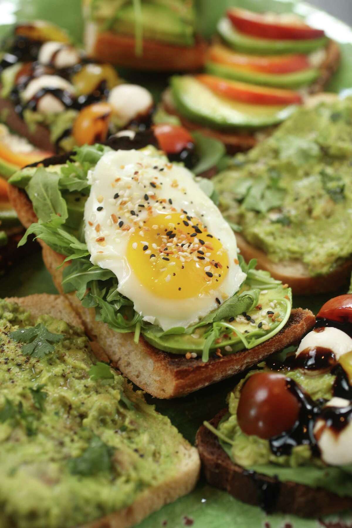 We created four avocado toast recipes that will fill the void in your life caused by crushing debt.
