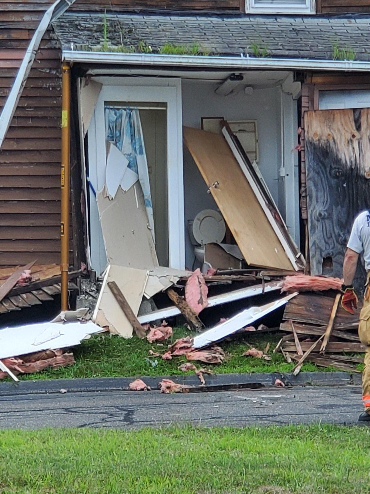 Police: Car crashes into Milford home