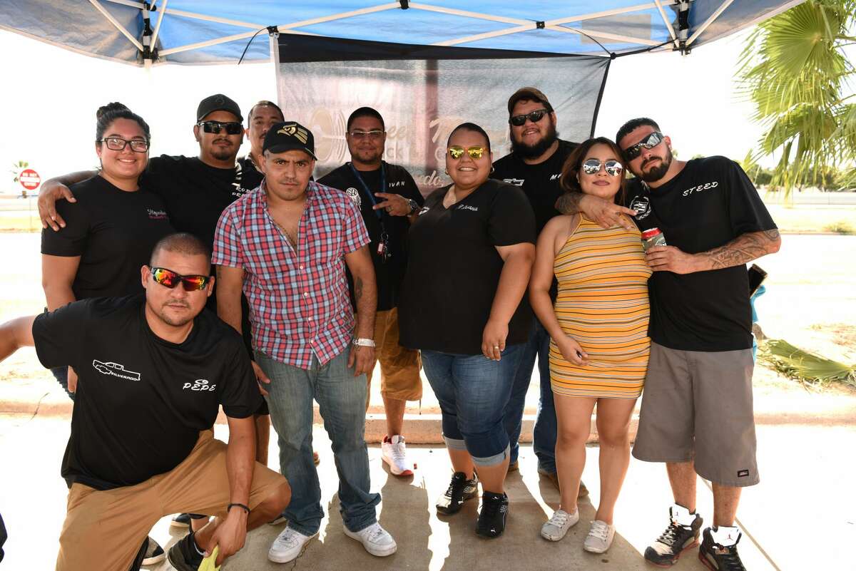Car clubs and car enthusiasts gathered to show off their rides and donate school supplies to children before going back to school at Pep Boys, Sunday, August 4, 2019.
