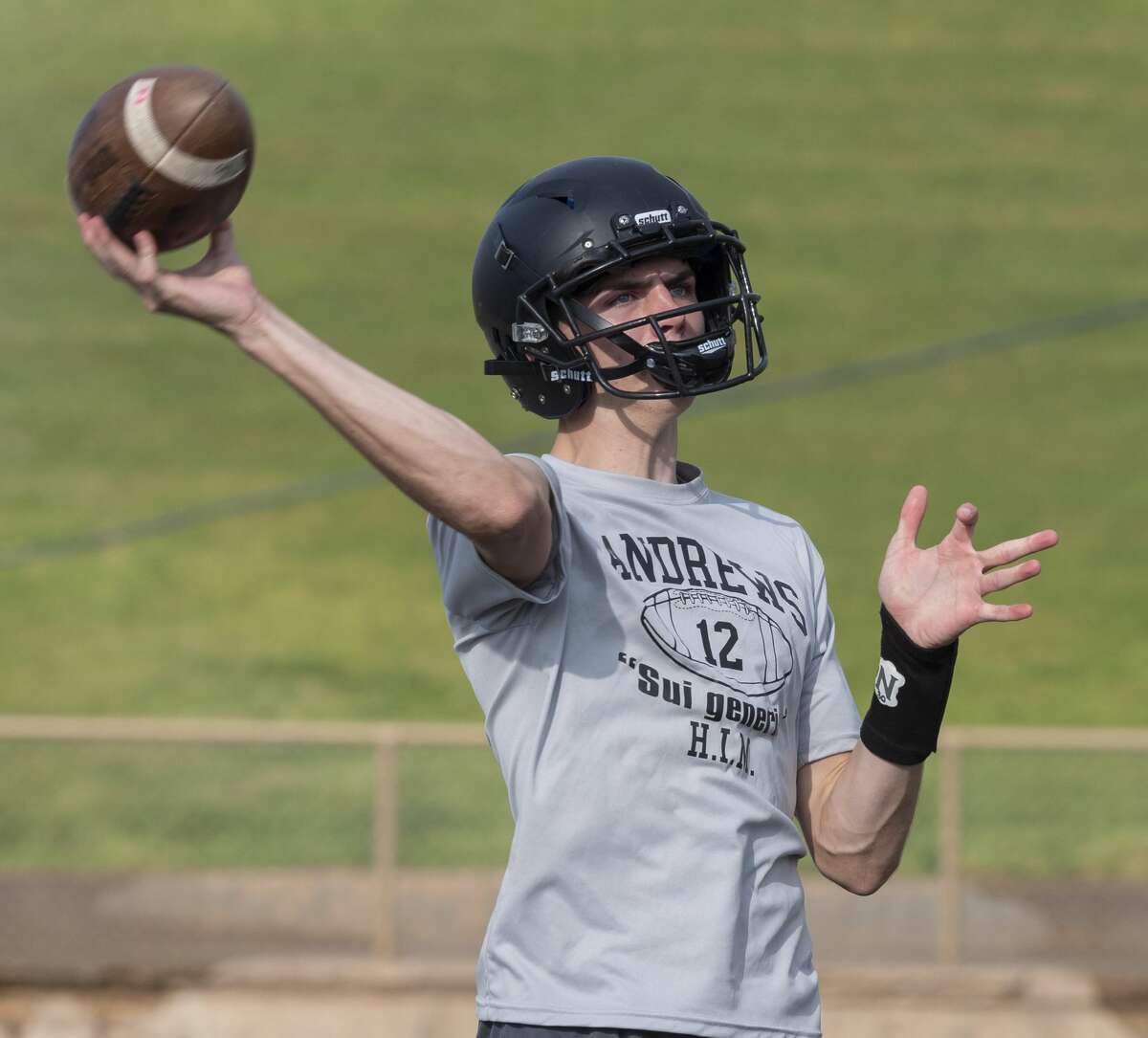 Andrews' quarterback Brett Leach looks to pass 08/06/19 during morning practice. Tim Fischer/Reporter-Telegram