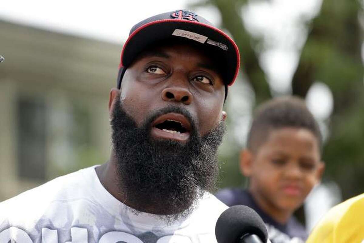 Michael Brown Sr. speaks to media in the 2015 Associated Press file photo.