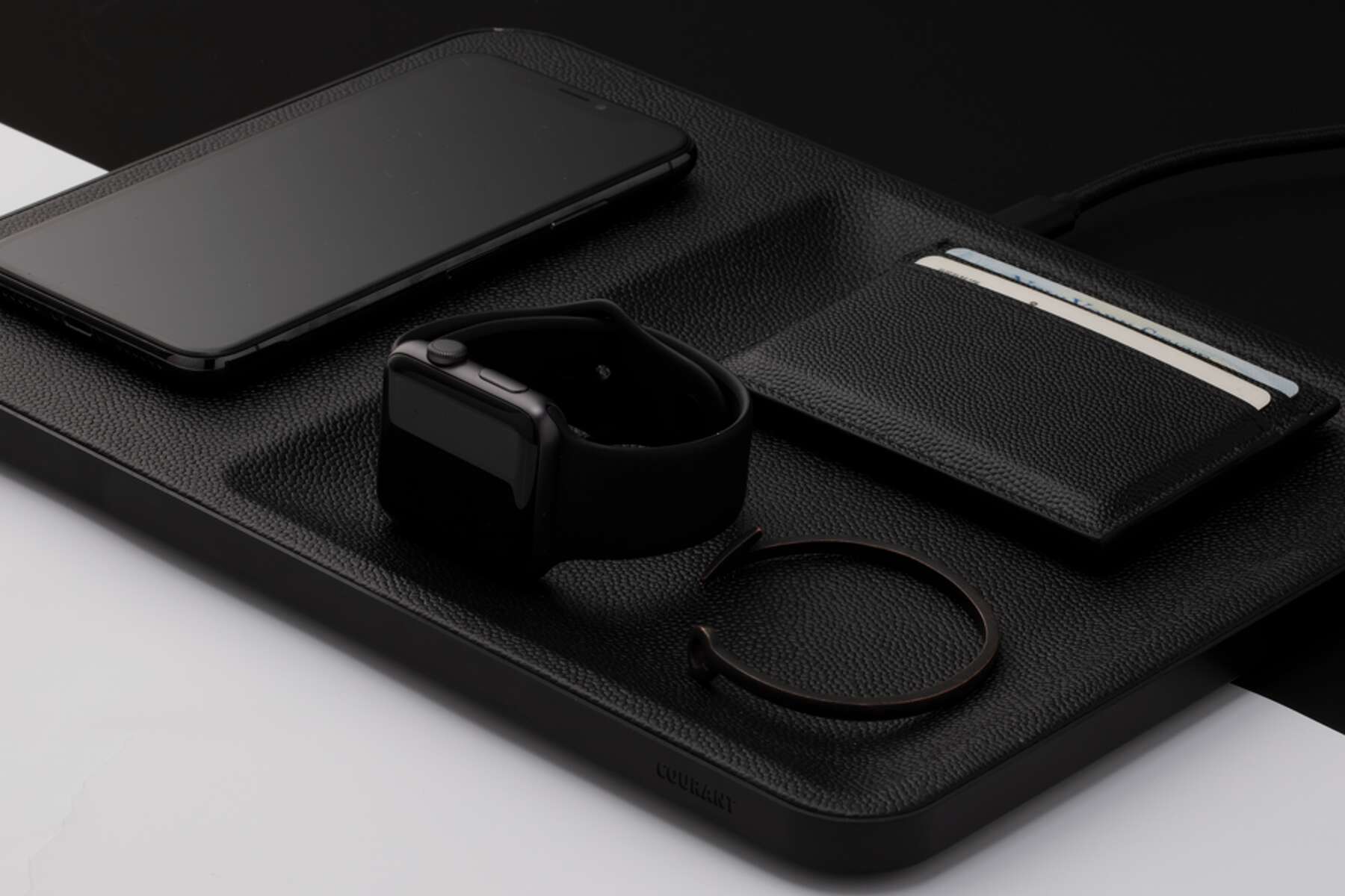 Courant s Fast Beautiful Wireless Charger Doubles as a Valet