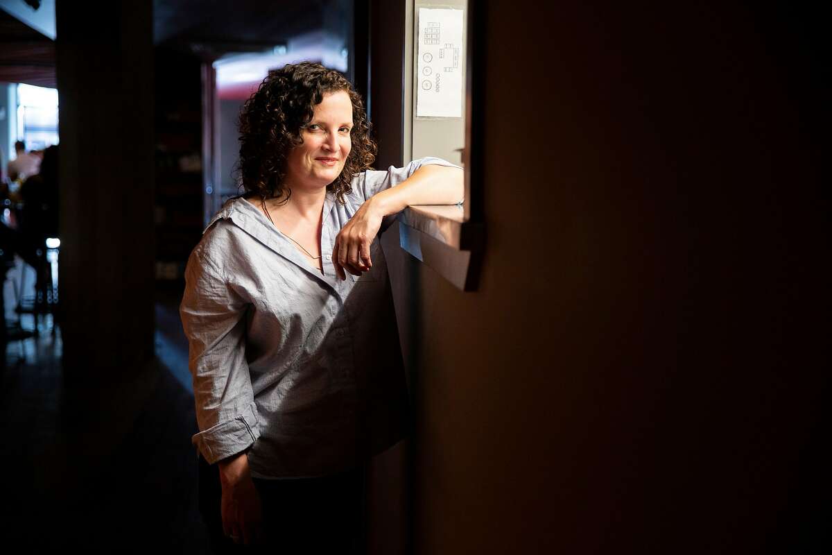 A portrait of bar owner Jennifer Colliau at Here's How, Thursday, Aug. 1, 2019, in Oakland, Calif. The bar is located at 1780 Telegraph Ave.