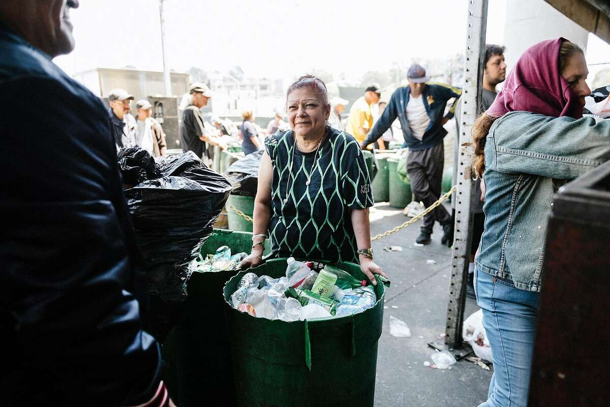 Patricia Vasquez of Daly City, waits in line to have her recycling weighed, at Our Planet Recycling in San Francisco, Calif, on Tuesday, August 6, 2019.