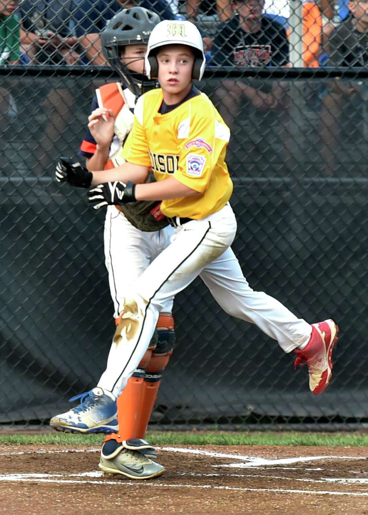 Connecticut’s Christian Kells scores in the first inning against Massachusetts during the Little League Eastern Regional on Tuesday.