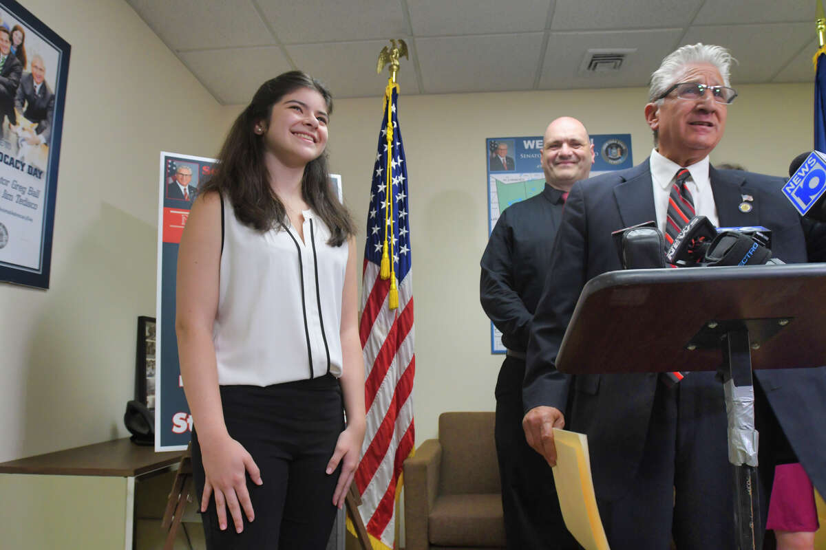 Actor Gabby Pizzolo, left, at an event at Senator Jim Tedisco's district office on Wednesday, Aug. 7, 2019, in Clifton Park, N.Y. Senator Tedisco, right, presented Pizzolo a New York State Senate Proclamation to celebrate her hard work. Pizzolo played the part of "Suzie" in the third season of the hit Netflix television program "Stranger Things 3." Pizzolo will be a junior at Niskayuna High School. (Paul Buckowski/Times Union)