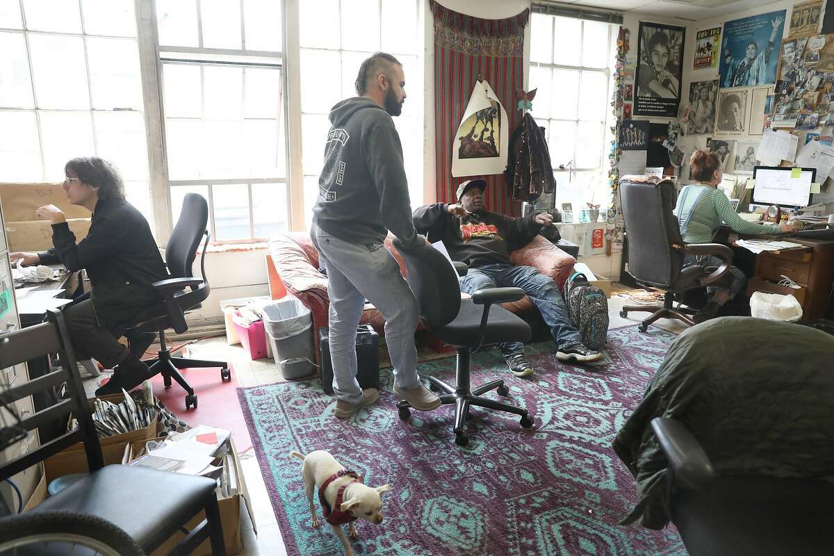 Left to right--Development director Jay Rice, human rights organizer Armando Garcia, volunteer for human rights Anthony Frazier, and director Jenny Jenny Friedenbach work in the office on Monday, Aug. 5, 2019, in San Francisco, Calif. Coalition on Homeless have lost their lease and have to move by October.
