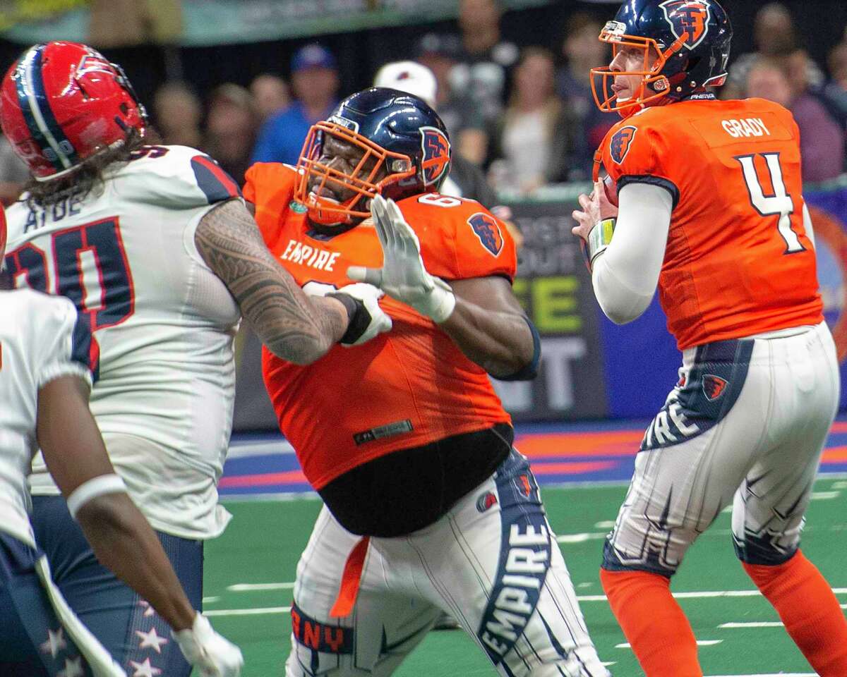 Albany Empire center Ryan Cave protects quarterback Tommy Grady during a game against the Washington Valor at the Times Union Center on Saturday, May 4, 2019 (Jim Franco/Special to the Times Union.)