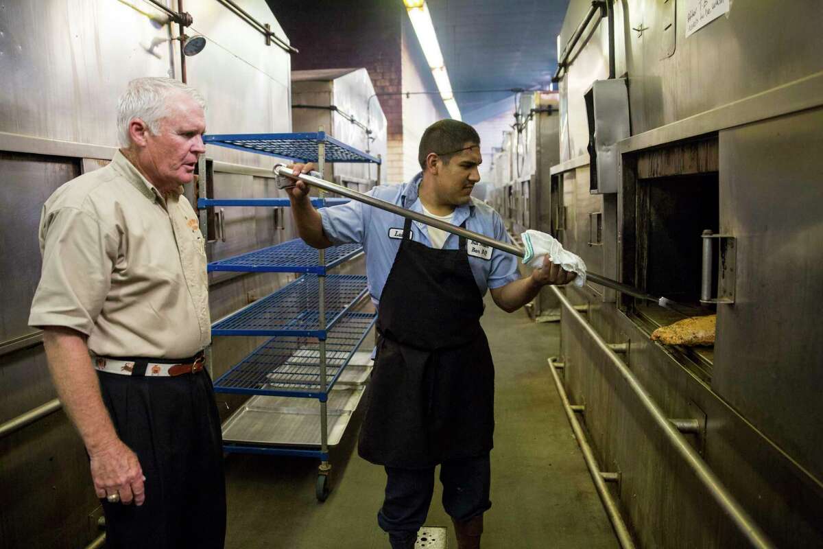 Balous Miller watches as Luis Villegas checks the temperature of a chicken breast at the Bill Miller Bar-B-Q Commissary in San Antonio in 2015. Bill Miller Bar-B-Q found itself the center of attention this week after U.S. Rep. Joaquin Castro, D-San Antonio, posted the names and employers of the city’s 44 most influential Trump donors on Twitter. It included Balous Miller, the chain’s owner.