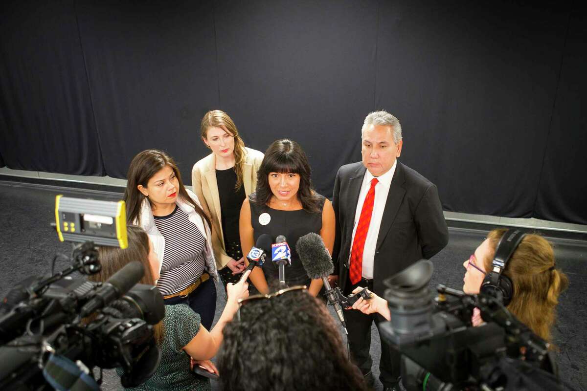 In this March file photo, Houston ISD Board President Diana Dávila (center) is joined by trustees Elizabeth Santos, Holly Maria Flynn Vilaseca and Sergio Lira talk with reporters. Texas Education Commissioner Mike Morath announced this week that he plans to strip power from the elected trustees and appoint a new board. His agency’s officials plan to host four community meetings in November to discuss the move.