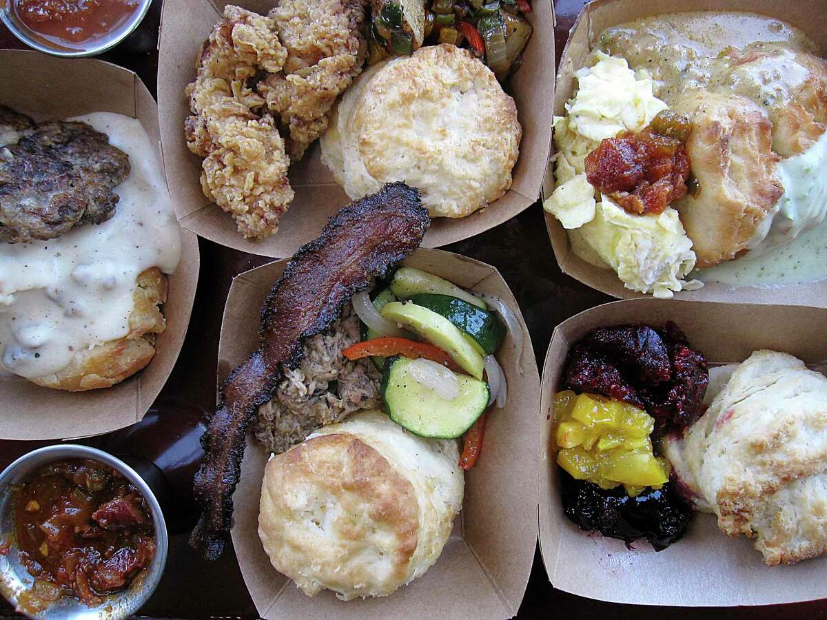 Options on the buffet at Alamo Biscuit Co. & Panadería include biscuits with sausage gravy, boneless fried chicken thighs, breakfast potatoes, scrambled eggs, chorizo gravy, poblano gravy, housemade jams, sauteed vegetables, pulled pork and smoked bacon.