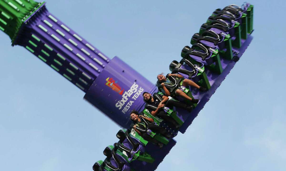 Six Flags Fiesta Texas previews its “Joker Carnival of Chaos” ride in August 2019. The park is reopening June 19.