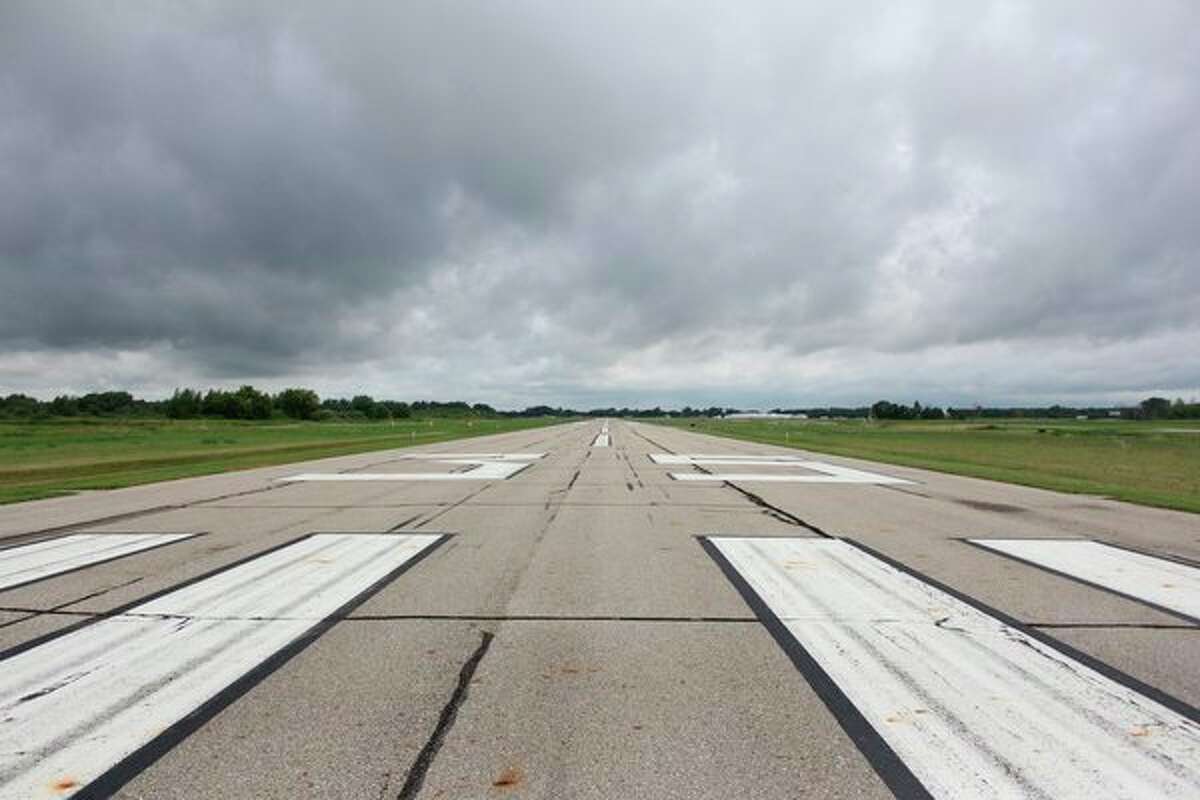 The 5,009-foot long runway at the Huron County Memorial Airport in Bad Axe is scheduled to be repaved sometime next year. (Robert Creenan/Huron Daily Tribune)
